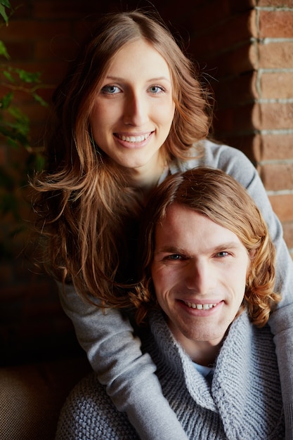 Free photo lovely young couple hugging