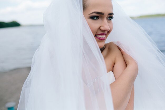 Loving bride touching her shoulder