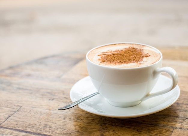 Loving coffee Cup of fresh cappuccino with heart sign