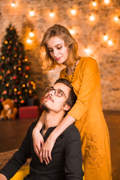 Loving couple celebrating christmas together