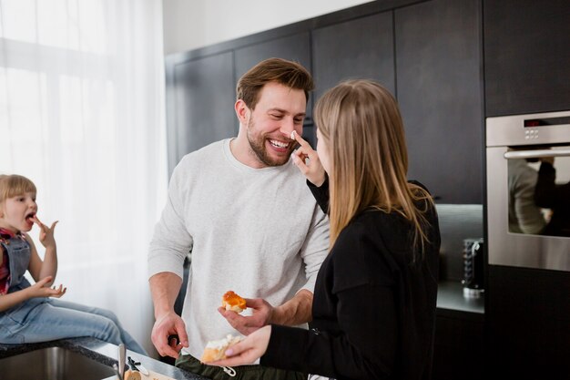 Loving couple cooking and having fun