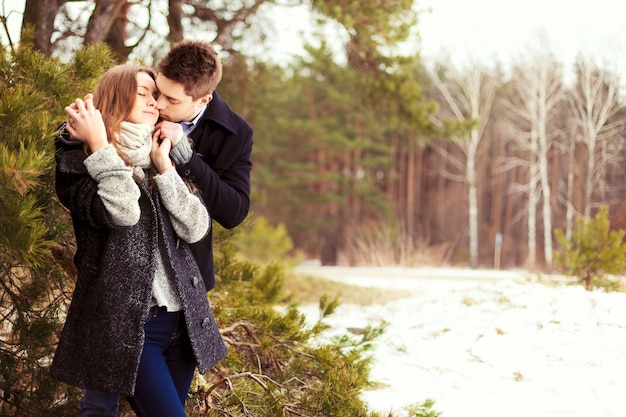 Loving couple in the forest