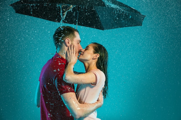 The loving couple in the rain