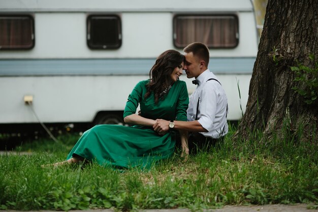 Loving couple sitting on the lawn