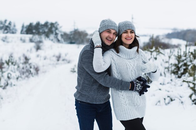 Loving couple standing in nature