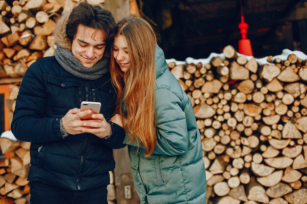 Loving couple standing in a winter park