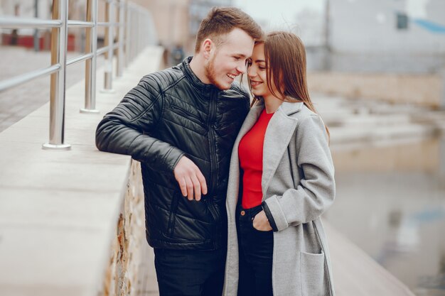 Loving couple walking around the river.