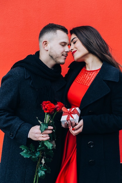 Free photo loving man and woman with presents