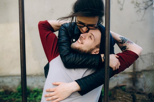 Loving woman hugging her boyfriend