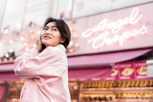 Free photo low angle of beautiful girl in japan