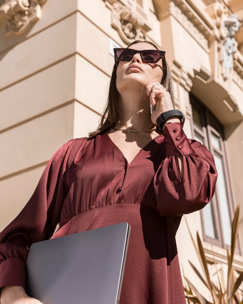 Low angle business woman outdoors