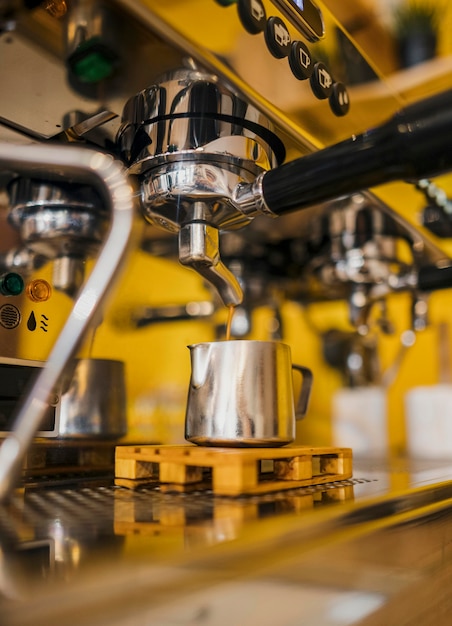 Free photo low angle of coffee machine from shop