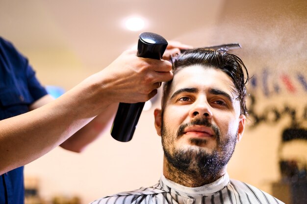 Low angle costumer at hair salon