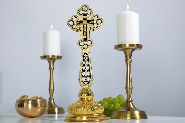 Low angle eucharist celebration with cross