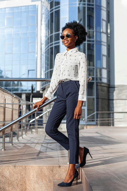 Low angle fashionable female looking away