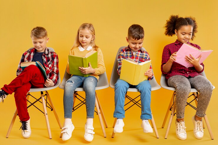 Free Photo low angle group of childrens reading