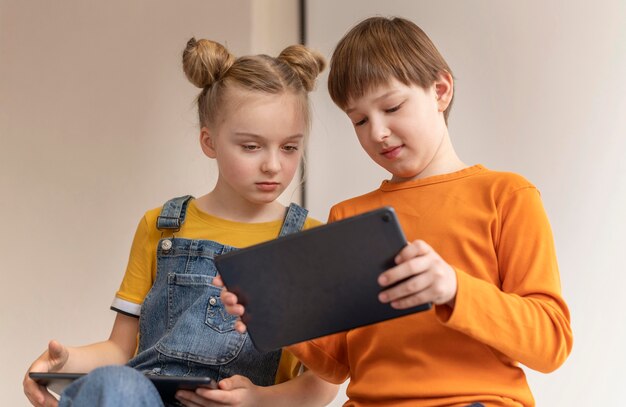 Low angle kids learning with devices