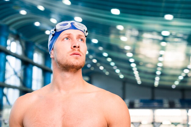 Low angle male with goggles looking up