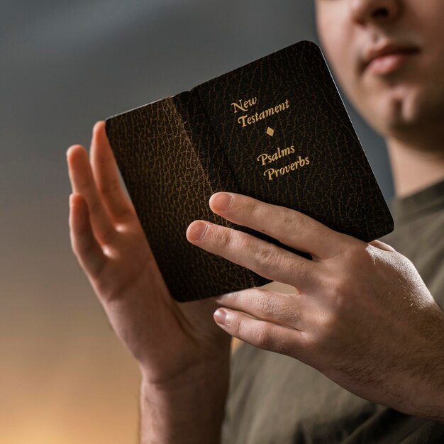 Low angle of man reading the bible