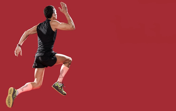 Free Photo low angle man running with copy-space
