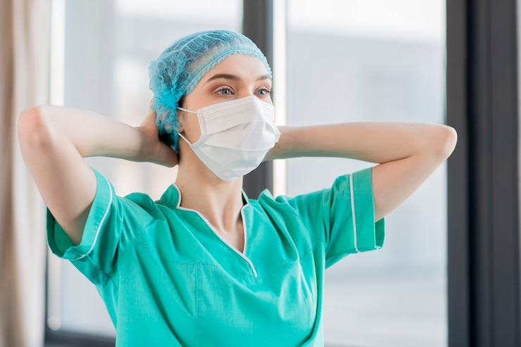 Free Photo low angle nurse tired