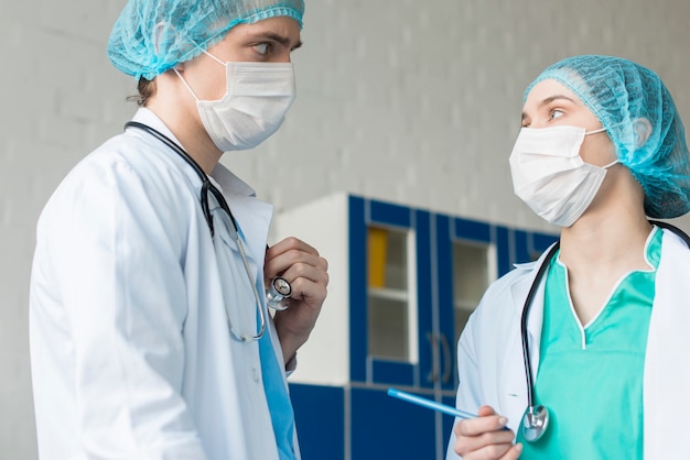 Free photo low angle nurses talking