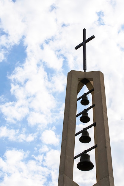Low angle religious monument with cross on top
