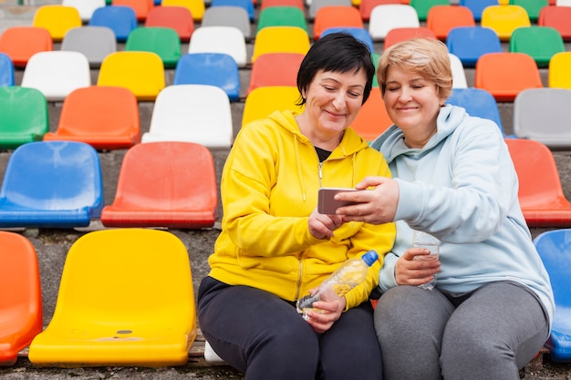 Low angle senior couple at stadium