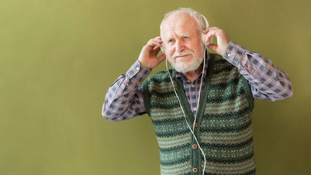 Low angle senior with headphones