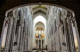 Free photo low angle shot of the beautiful altar in catedral de la almudena captured in madrid, spain