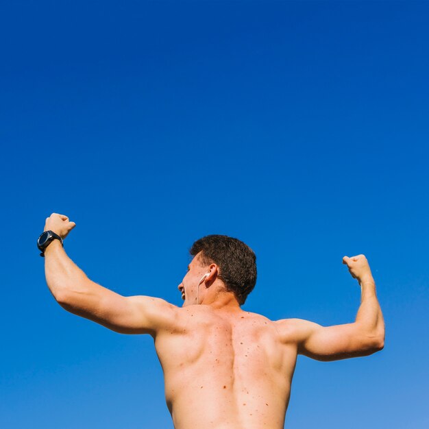 Low angle shot of body builder's back