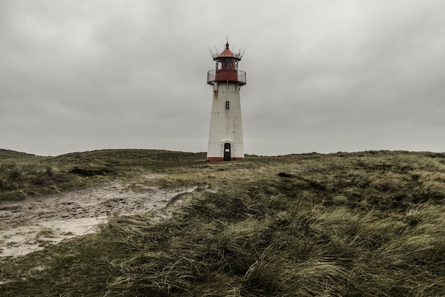 Low angle shot of the Lighthouse List East at Sylt, Germany under the storm clouds