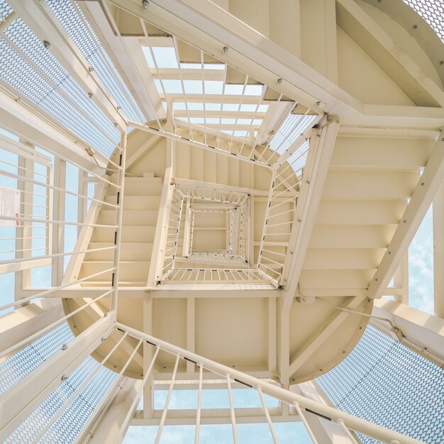 Low angle shot of a metal staircase going up