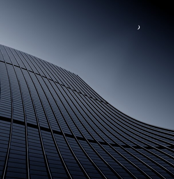 Low angle shot of a modern business building touching the clear sky