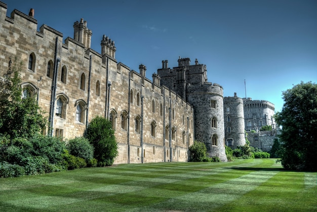 Low angle shot of St George's Chapel  in the middle of a park in Windsor, UK