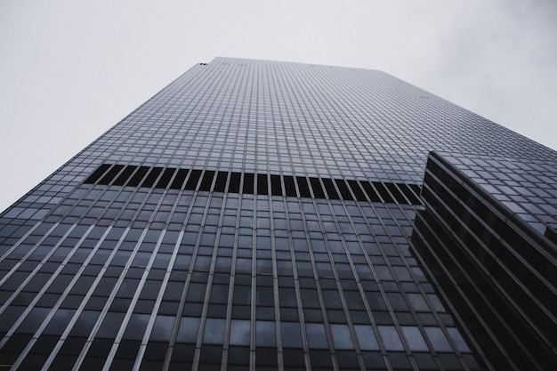 A low angle shot of a tall skyscraper business building in NYC