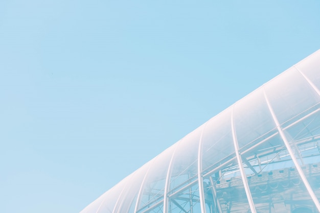 Free photo low angle shot of a white glass building with interesting textures - great for a cool background