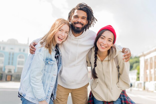 Low angle smiley friends hug