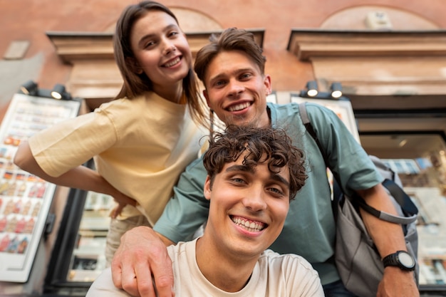 Low angle smiley friends posing together