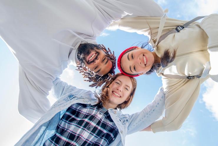 Free Photo low angle smiley friends