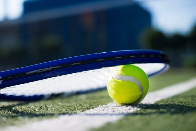 Low angle tennis racket on the ball