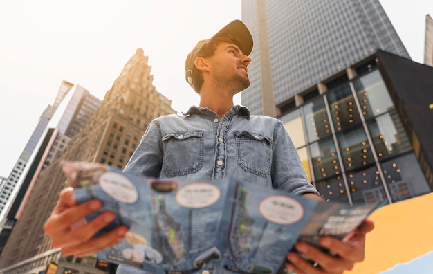 Free photo low angle view of man in city