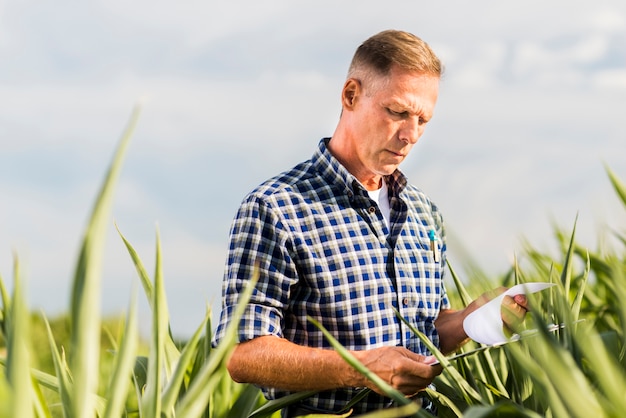 Low angle view man with a clipboard