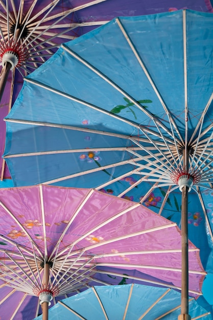 Free photo low angle wagasa umbrellas arrangement