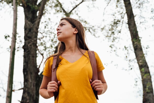 Low angle of woman looking away