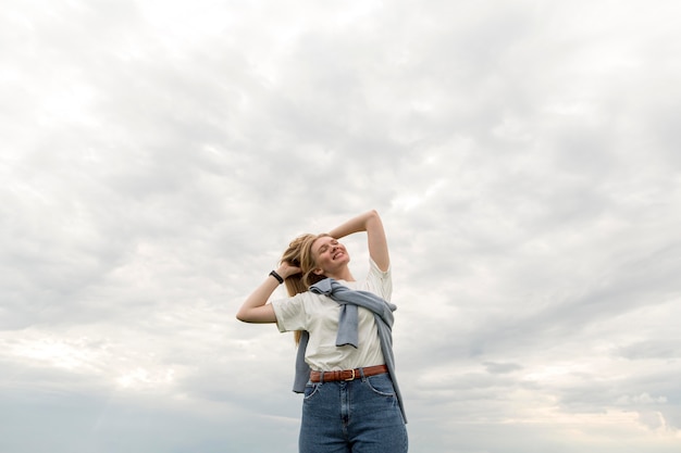 Low angle of woman posing outdoors