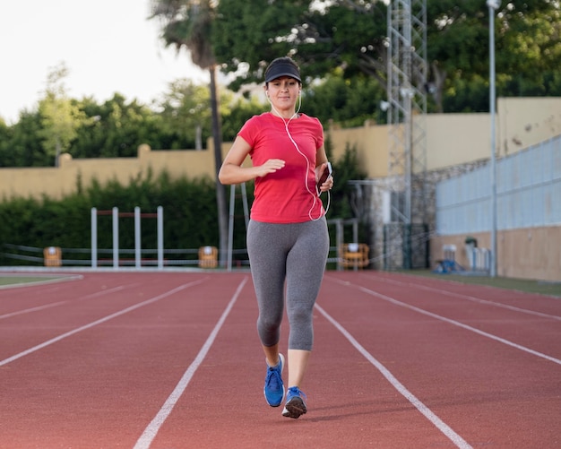 Low angle woman running