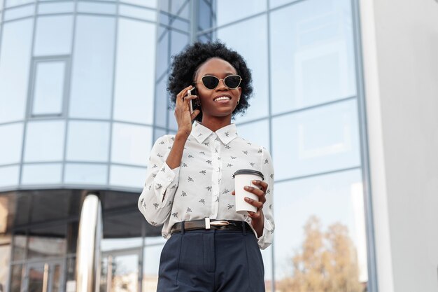 Low angle woman talking over phone