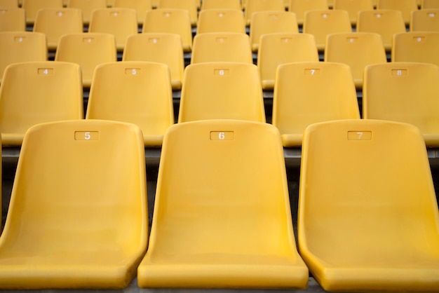 Low angle yellow grandstands rows