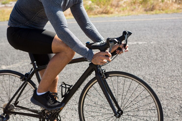 Free Photo low section of athlete cycling